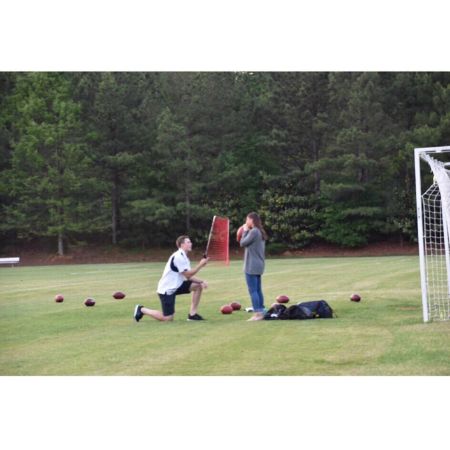 Isabelle Butker and Harrison Butker pictured together on the day Harrison popped the question. 